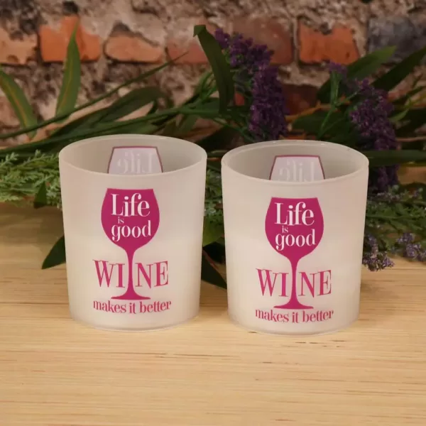 LUMABASE Battery Operated Wax Filled Glass LED Candles - Life is Good, Wine Makes it Better (Set of 2)